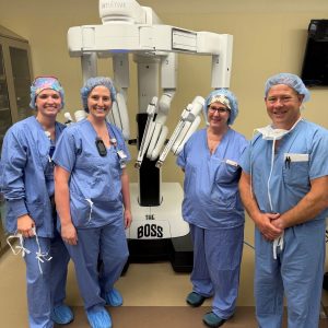 Dr. Scott Crouch (right), general surgeon with HSHS St. Elizabeth’s Hospital, performed the first robotic-assisted surgery with the hospital’s third da Vinci surgical system, the da Vinci® 5. (Courtesy of HSHS)