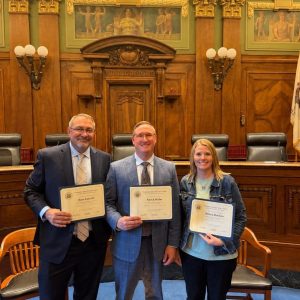 Trial Court Administrator Ryan Anderson (left), Circuit Clerk Patrick McRae (center) and Chief Deputy Circuit Clerk Missy Bickmore display their Certified Court Manager credentials during a June 26 graduation ceremony at the Illinois Supreme Court. The trio completed the nationally recognized leadership program through the Illinois Judicial College and the National Center for State Courts’ Institute for Court Management.
